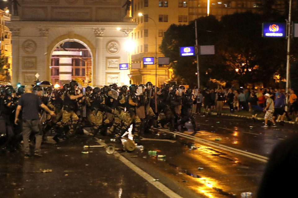 FILE - Police confront protesters near the parliament building in Skopje, North Macedonia, late Tuesday, July 5, 2022. Nightly protests in North Macedonia over the past week have left dozens injured. At the heart of the turmoil is the small Balkan country’s long-running quest to join the European Union, a process that has faced one hurdle after the other. (AP Photo/Boris Grdanoski, File)