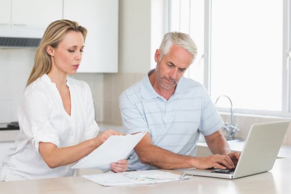 Couple reviewing their investments