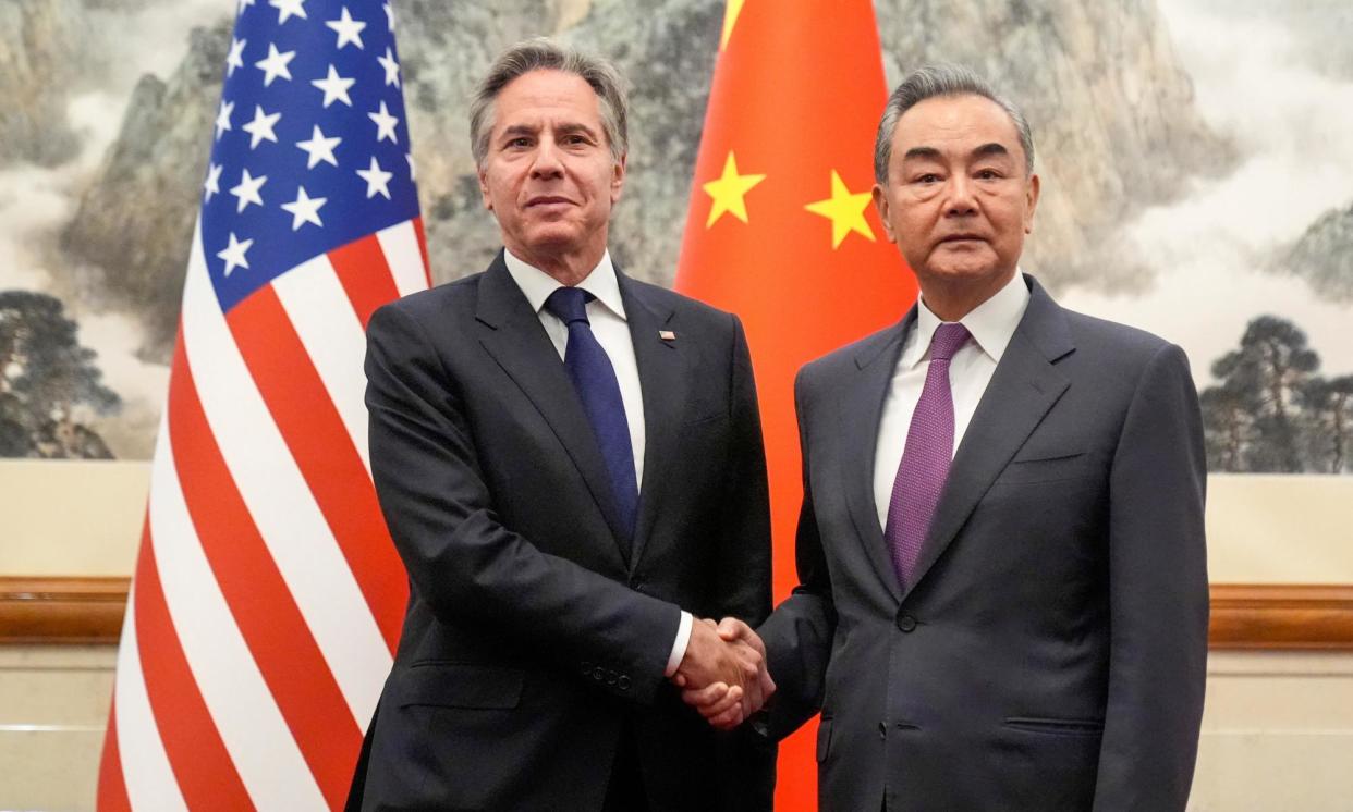 <span>US secretary of state Antony Blinken, left, meets with China's foreign minister Wang Yi at the Diaoyutai State Guesthouse in Beijing.</span><span>Photograph: Mark Schiefelbein/Reuters</span>