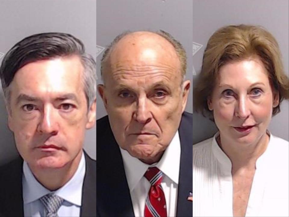 A composite image of the mugshots of Kenneth Chesebro, Rudy Giuliani, and Sidney Powell.