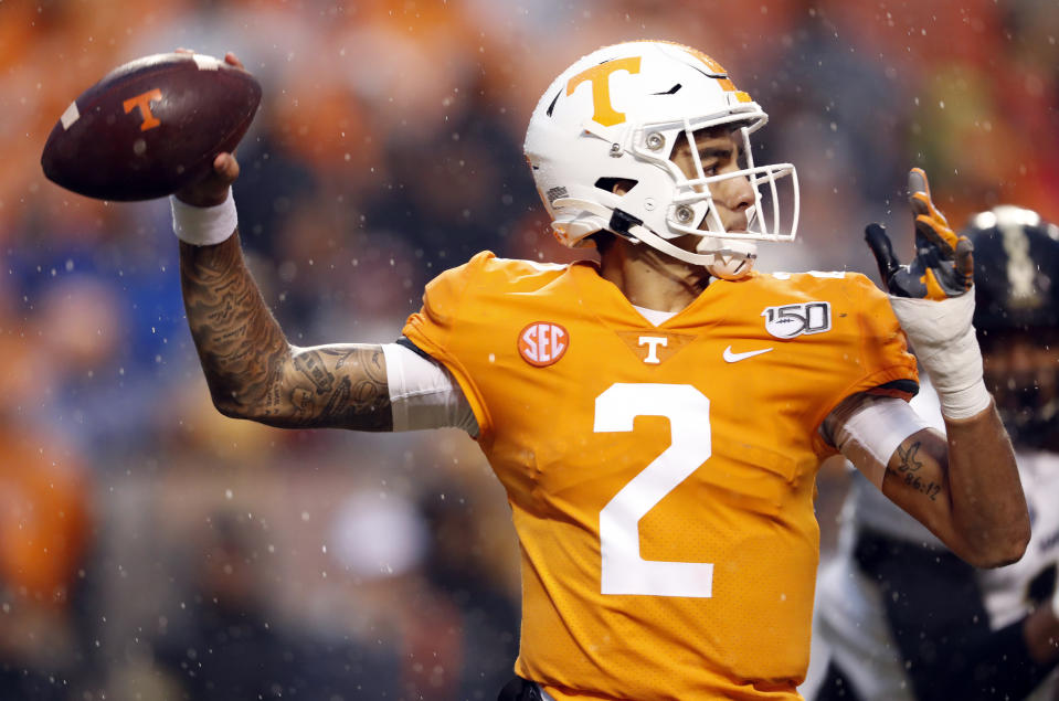 Tennessee quarterback Jarrett Guarantano (2) throws to a receiver in the first half of an NCAA college football game against Vanderbilt, Saturday, Nov. 30, 2019, in Knoxville, Tenn. (AP Photo/Wade Payne)