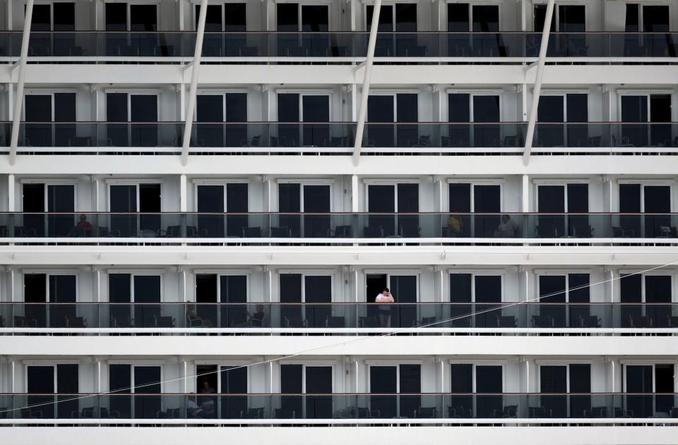 15 Tourists are seen at Cruise liner MSC Meraviglia, while berthed at a dock in Punta Langosta after two Caribbean ports denied the ship entry due to fears, later disproven, that a crew member was infected with the coronavirus, in Cozumel