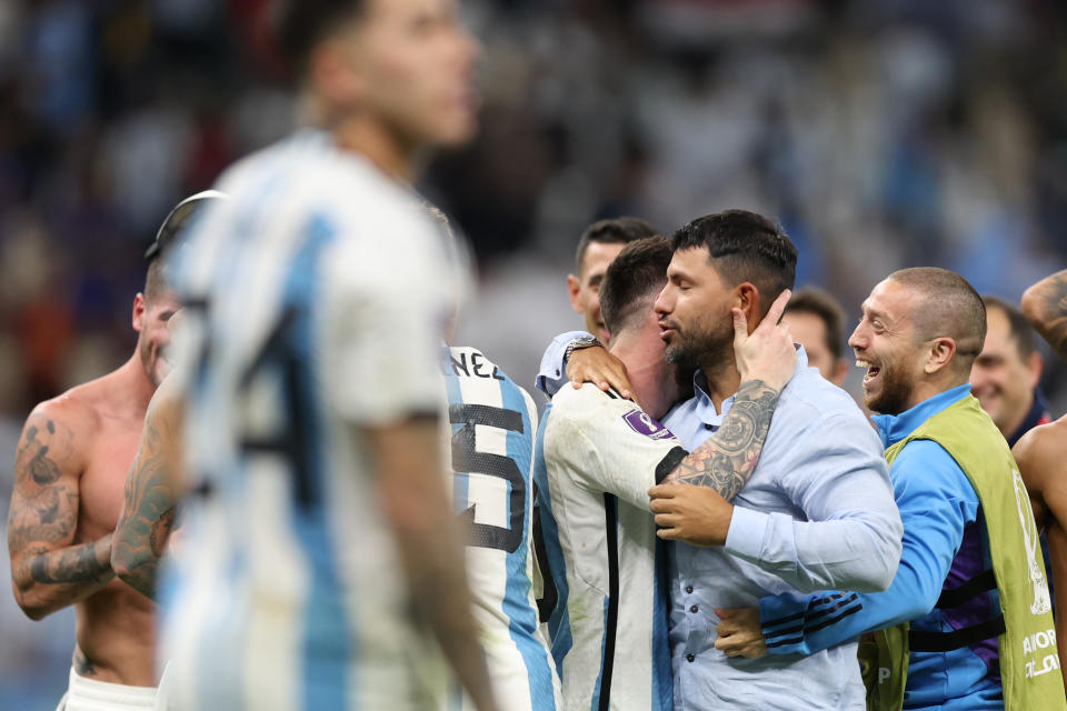 LUSAIL CITY, QATAR - DECEMBER 09: Former Argentine player Sergio Aguero congratulates Lionel Messi of Argentina after the team's victory in the penalty shoot out  during the FIFA World Cup Qatar 2022 quarter final match between Netherlands and Argentina at Lusail Stadium on December 09, 2022 in Lusail City, Qatar. (Photo by Clive Brunskill/Getty Images)