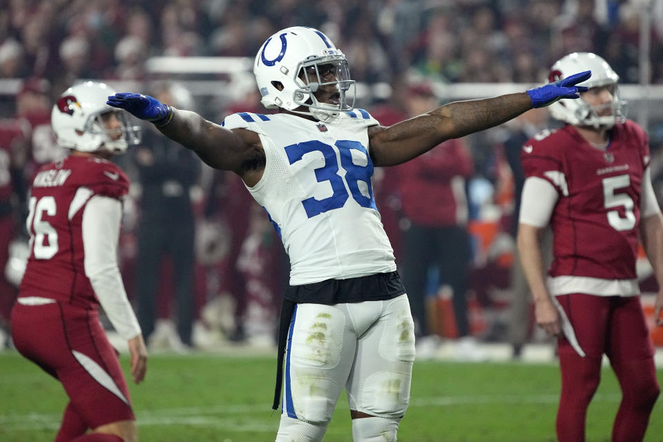 Indianapolis Colts defensive back T.J. Carrie (38) signals after Arizona Cardinals kicker Matt Prater (5) missed his field goal attempt during the second half of an NFL football game, Saturday, Dec. 25, 2021, in Glendale, Ariz. (AP Photo/Rick Scuteri)
