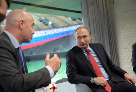 Russian President Vladimir Putin meets with FIFA President Gianni Infantino at the FC Krasnodar Stadium in the southern city of Krasnodar, Russia, May 23, 2017. Sputnik/Aleksey Druzhinin/Kremlin via REUTERS