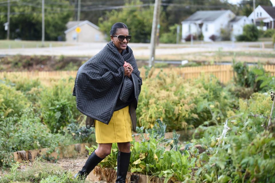 Sheila Walton tours the grounds at Payne Avenue Community Garden. It now has 36 garden beds, with plans to have 100 by its completion.