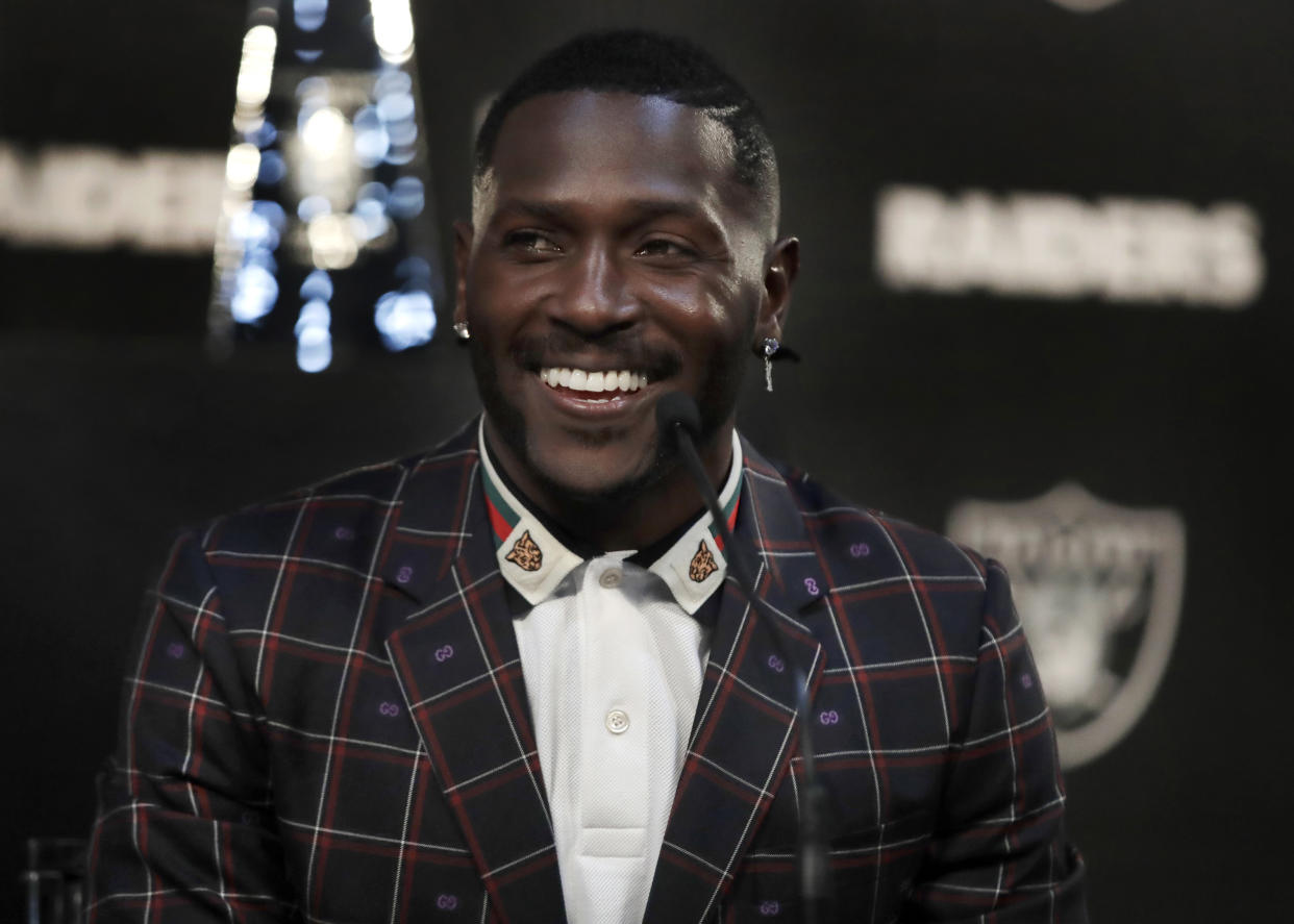 Oakland Raiders wide receiver Antonio Brown wants your help in finding a new helmet. (AP)