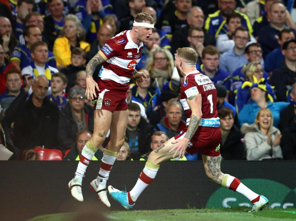 Dom Manfredi celebrates with Sam Tomkins (Getty)