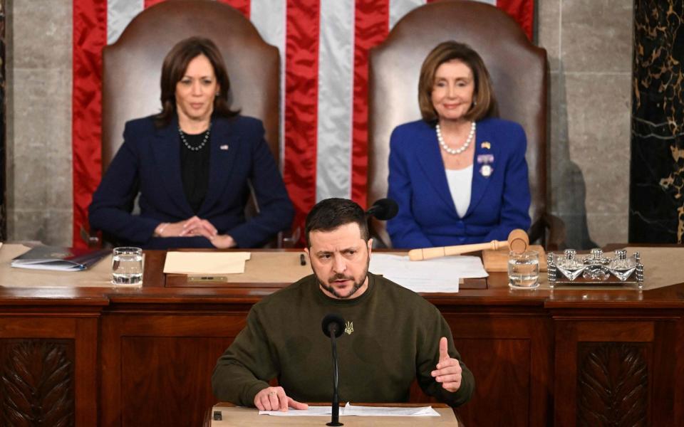 Ukraine's President Volodymyr Zelensky addresses the US Congress flanked by US Vice President Kamala Harris (L) and US House Speaker Nancy Pelosi