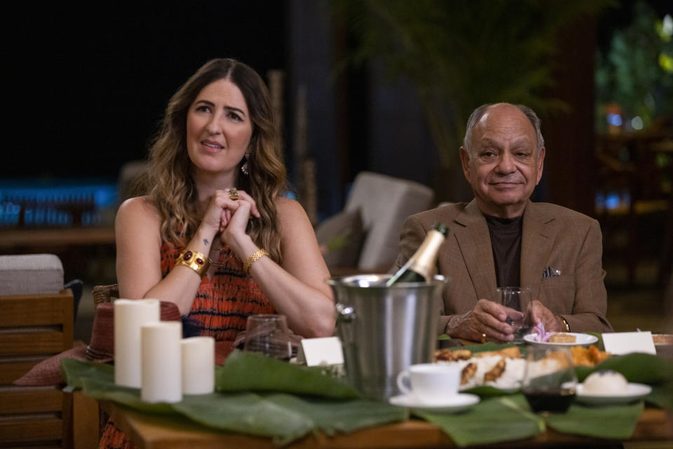 This image released by Lionsgate shows D'Arcy Carden, left, and Cheech Marin in a scene from "Shotgun Wedding." (Ana Carballosa/Lionsgate via AP)
