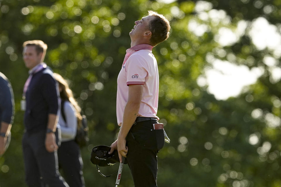 Justin Thomas celebrates after winning the PGA Championship golf tournament in a playoff against Will Zalatoris at Southern Hills Country Club, Sunday, May 22, 2022, in Tulsa, Okla. (AP Photo/Matt York)