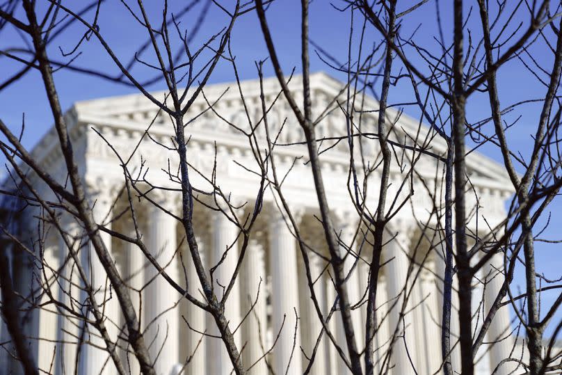 A US Supreme Court police officer patrols outside the US Supreme Court Friday, Jan. 5, 2024, in Washington.