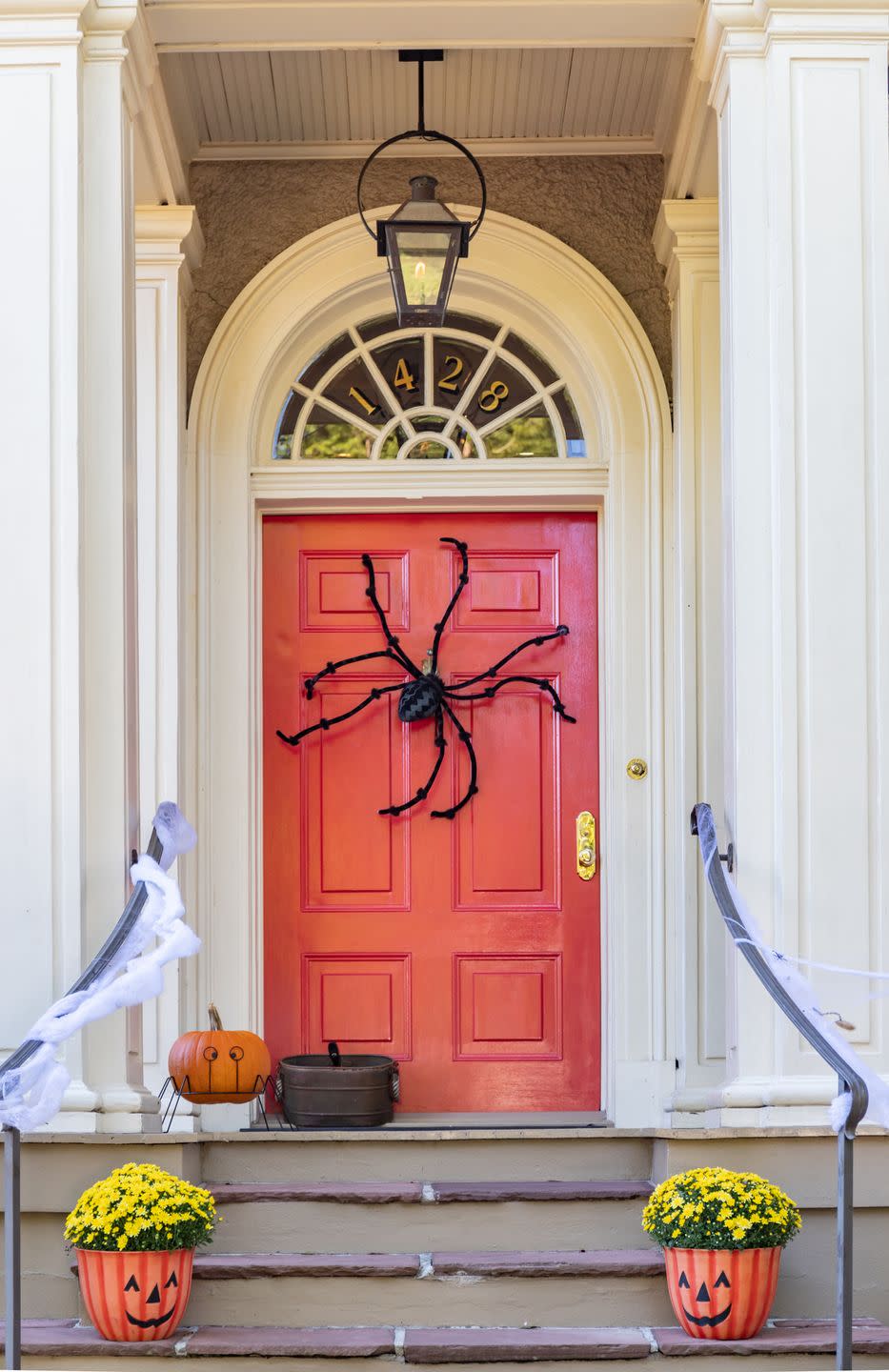 door decorated for halloween in the garden district of new orleans