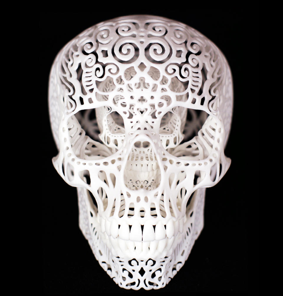 This undated publicity photo provided by Chicago artist, Joshua Harker, 43, shows his design creation, Crania Anatomica Filigre. 3D printing made it possible for Harker to sculpt his elaborate designs. (AP Photo/Joshua Harker)