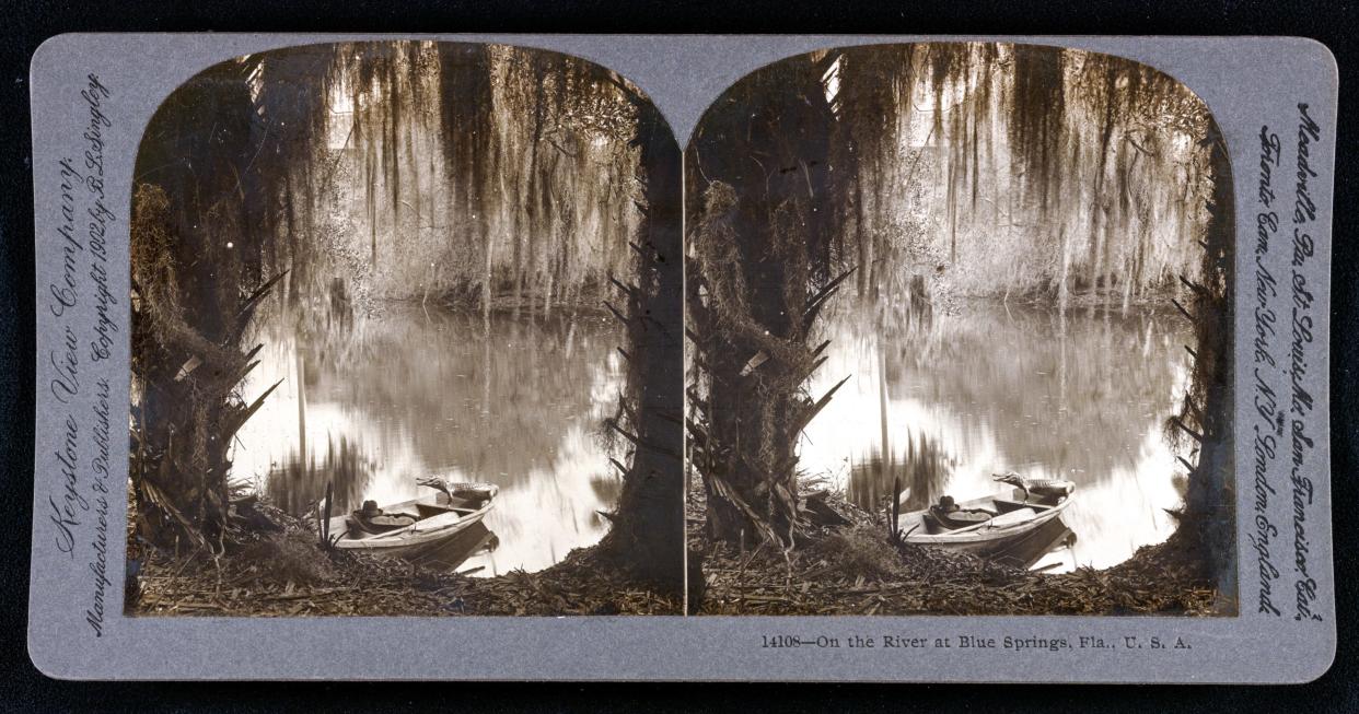 A stereoscopic photo card of Blue Spring from 1902.