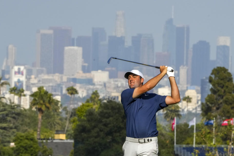 Scottie Scheffler hits from the fairway on the 13th hole during the final round of the U.S. Open golf tournament at Los Angeles Country Club on Sunday, June 18, 2023, in Los Angeles. (AP Photo/Lindsey Wasson)