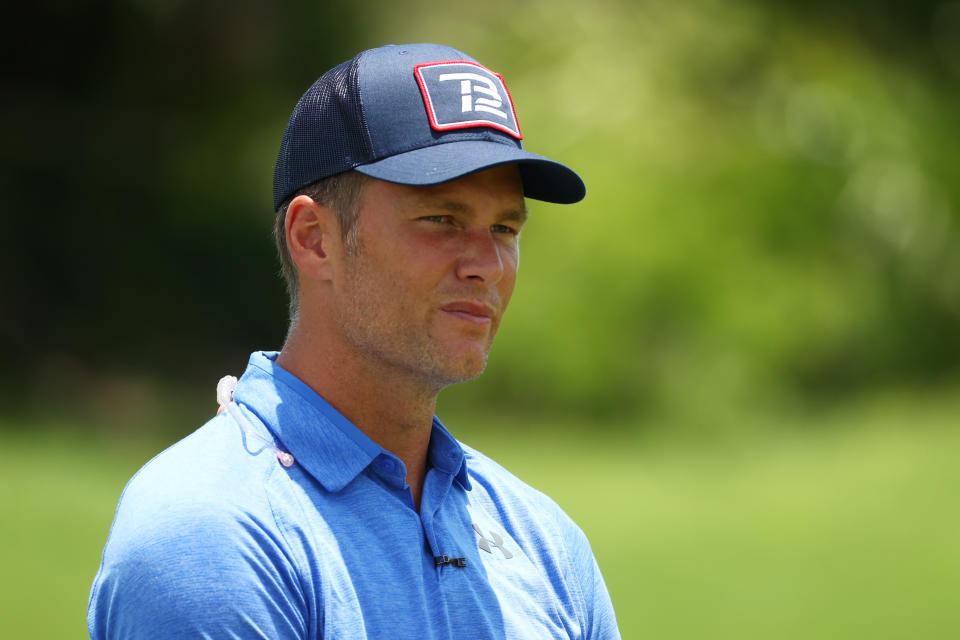 Tom Brady is working out with his new teammates and we have proof. (Photo by Mike Ehrmann/Getty Images for The Match)