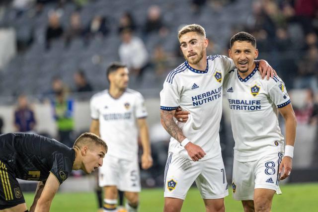 Galaxy winger Tyler Boyd (center) celebrates his goal with Marco Delgado during the U.S. Open Cup Round of 16 match against LAFC at BMO Stadium on Tuesday in Los Angeles. (Photo by Shaun Clark/Getty Images)