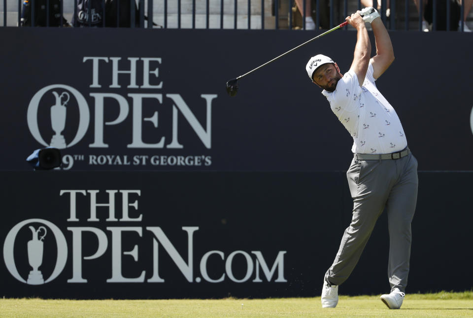 Spain's Jon Rahm play his shot from the 1st tee during the third round of the British Open Golf Championship at Royal St George's golf course Sandwich, England, Saturday, July 17, 2021. (AP Photo/Peter Morrison)