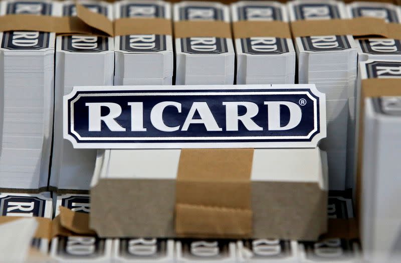 The logo of Ricard is seen on labels at the Ricard manufacturing unit in Lormont, near Bordeaux