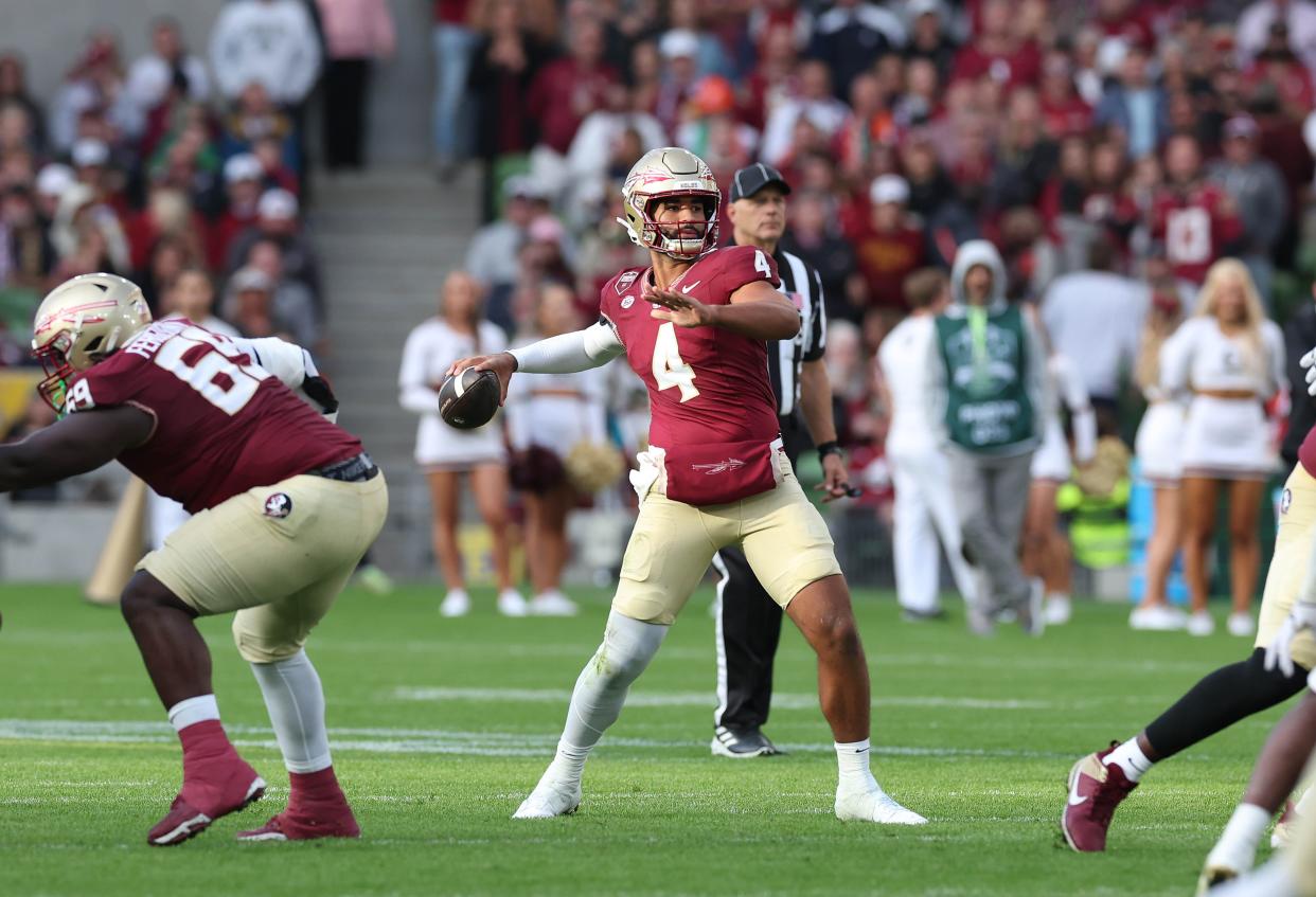 DUBLIN, IRELAND - AUGUST 24: DJ Uiagalelei of the Florida State Seminoles looks to throw during the Aer Lingus College Football Classic game at Aviva Stadium on August 24, 2024 in Dublin, Ireland. (Photo by Charles McQuillan/Getty Images)