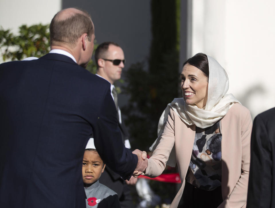 Britain's Prince William, left, shakes hands with New Zealand Prime Minister Jacinda Ardern during a visit to the Al Noor mosque in Christchurch, New Zealand, Friday, April 26, 2019. Prince William visited the one of the mosques where 50 people were killed and 50 others wounded in a March 15 attack by a white supremacist. (Joseph Johnson/Pool Photo via AP)