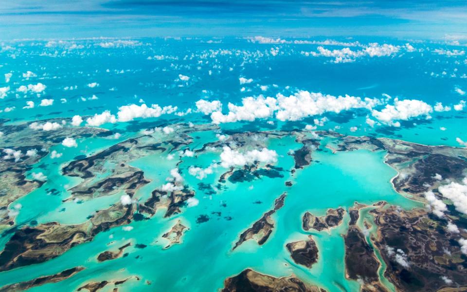 Andros Island in the Bahamas from a jet airplane window - Getty