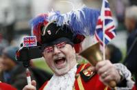 A Royal fan dressed as a Town Crier gathers to celebrate Queen Elizabeth's 90th birthday in Windsor, Britain April 21, 2016. REUTERS/Stefan Wermuth