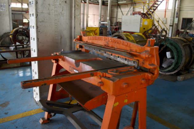 When the power station was built, equipment was brought from Britain, such as this heavy-duty cutter. Made by F. J. Edwards Ltd. in London, its sharp blades used to cut paper, thick plastic and wires.