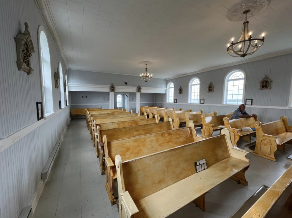 After more than a century of being the spiritual heartbeat of Portugal Cove South, Holy Rosary Catholic church is now inactive. (Terry Roberts/CBC)