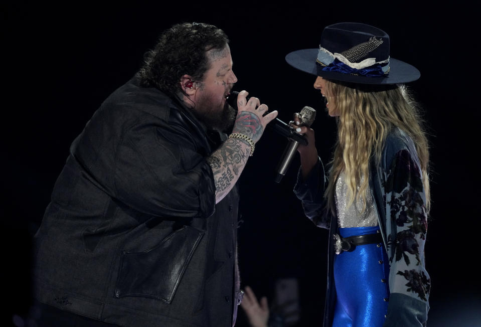 Jelly Roll, left, and Lainey Wilson perform "Save Me" at the 58th annual Academy of Country Music Awards on Thursday, May 11, 2023, at the Ford Center in Frisco, Texas. (AP Photo/Chris Pizzello)
