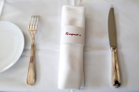 A table is set at the Fouquet's restaurant on the eve of its re-opening on the Champs Elysees, almost 4 months after it was ranksacked by a "yellow vests" protest in Paris