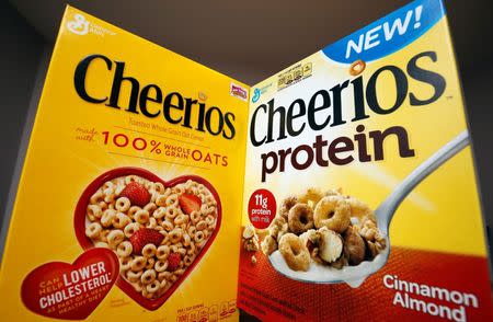 Two types of Cheerios cereal, one with protein (R) and one without, are seen in this photo illustration in Wilmette, Illinois September 12, 2014. REUTERS/Jim Young