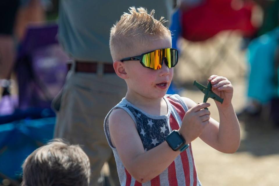 Jackson, 5, plays with a toy plane at the California Capital Airshow on Sunday at Mather Airport in Rancho Cordova.