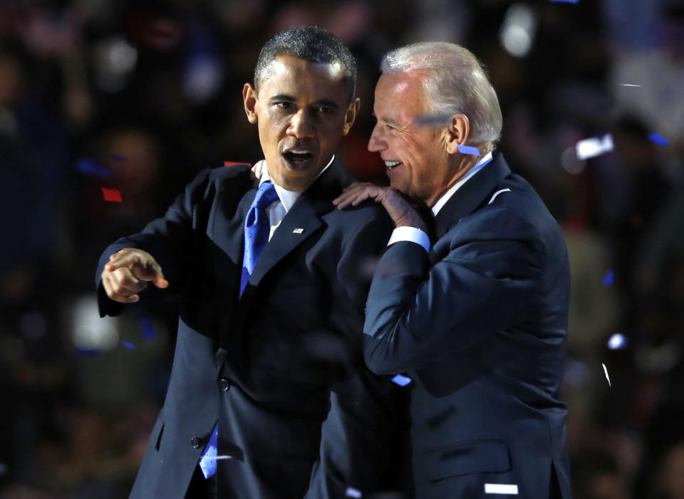 U.S. President Barack Obama gestures with Vice President Joe Biden after his election night victory speech in Chicago, November 6, 2012.  REUTERS/Larry Downing (UNITED STATES  - Tags: POLITICS TPX IMAGES OF THE DAY USA PRESIDENTIAL ELECTION ELECTIONS)