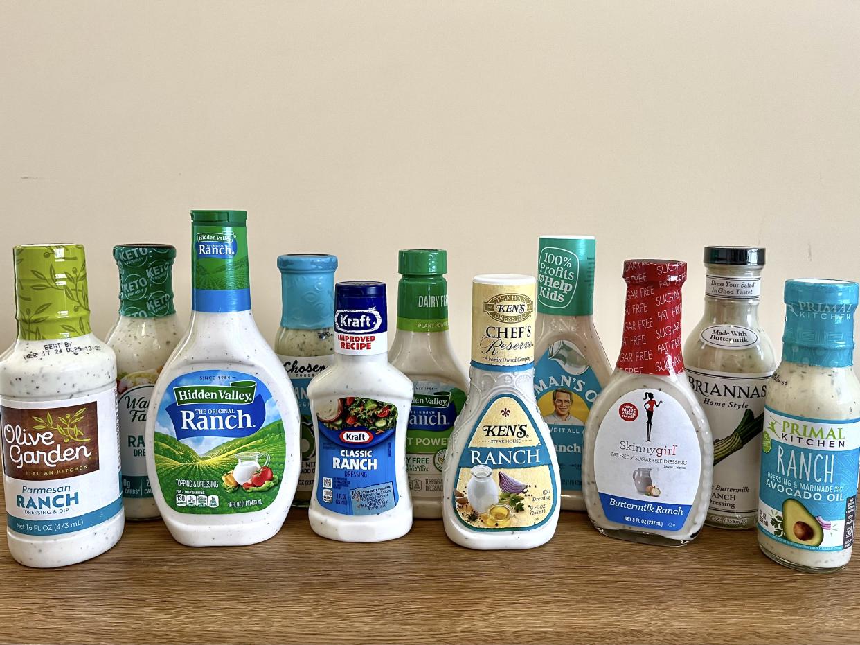 several different brands of ranch dressing sitting in a row