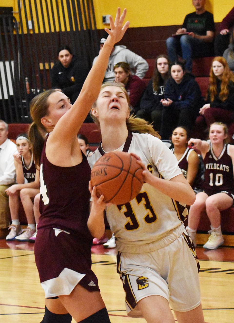 Case's Emma Plante  drives on West Bridgewater's Mia Harrington.