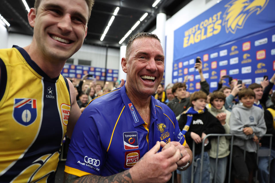 PERTH, AUSTRALIA - AUGUST 02: Elliot Yeo and Jarrad Schofield, interim senior coach of the Eagles celebrate winning the round 21 AFL match between West Coast Eagles and Gold Coast Suns at Optus Stadium, on August 02, 2024, in Perth, Australia. (Photo by Paul Kane/Getty Images)