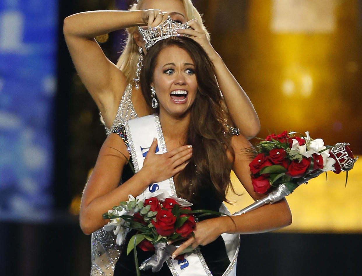 FILE - Miss North Dakota Cara Mund reacts after being named Miss America during the Miss America 2018 pageant in Atlantic City, N.J., Sunday, Sept. 10, 2017. Mund, the former Miss America who gained attention by criticizing the organization near the end of her reign in 2018, is planning to run for Congress in North Dakota as an independent, she announced Saturday, Aug. 6, 2022. (AP Photo/Noah K. Murray, File)