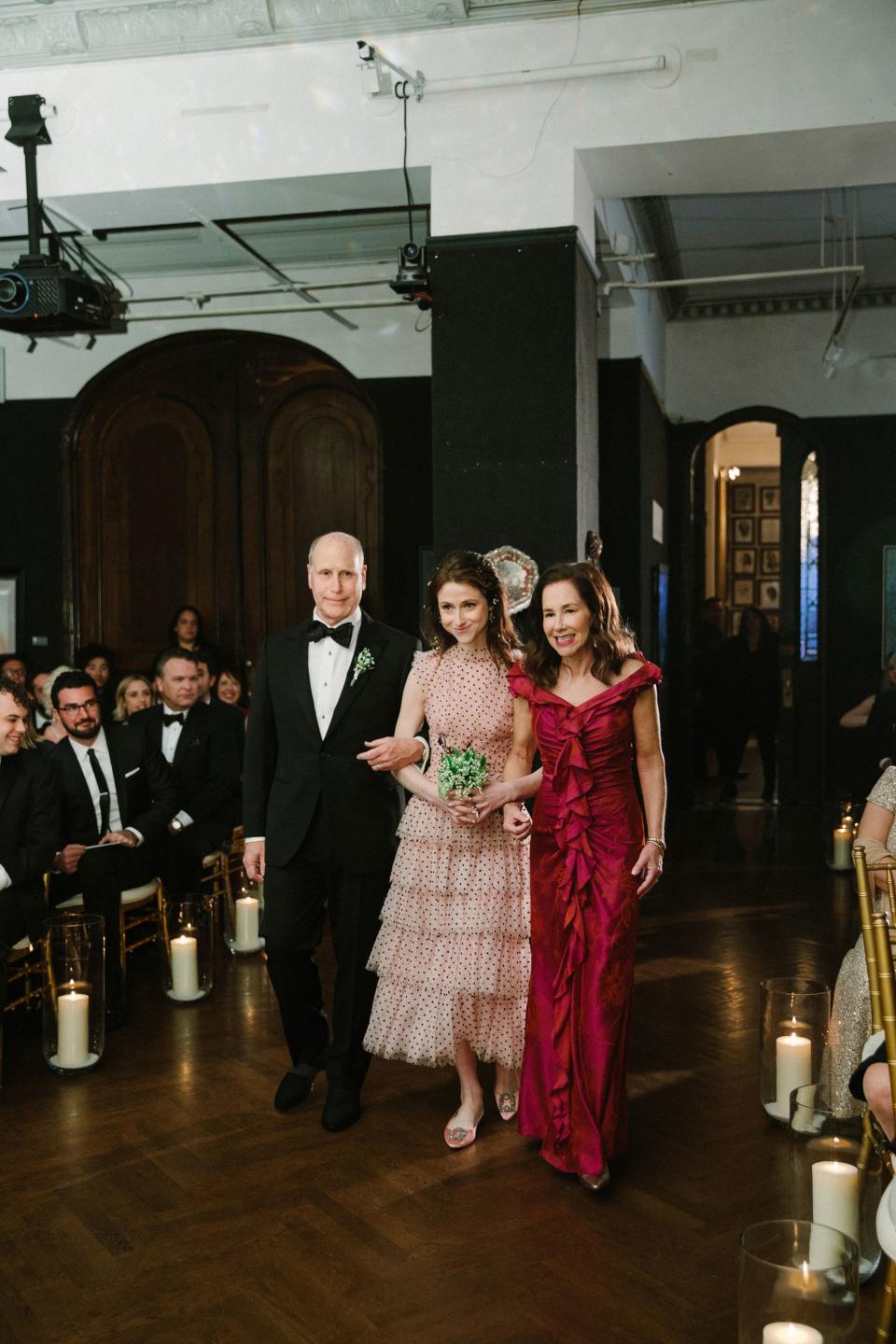 With my amazing parents! I am so, so lucky to be their child and do not take for granted how wildly fortunate I am they were both able to walk me down the aisle.