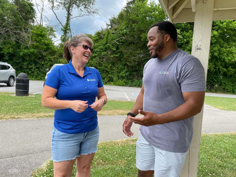 Suzanne Norris and Troy Fleming from Knox County Parks and Rec are on hand to help with the first Spring Lawn Games Festival held at Carl Cowan Park Sunday, May 22, 2022.