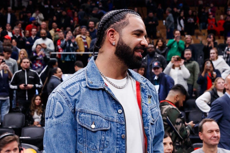 TORONTO, CANADA - NOVEMBER 17: Rapper Drake greets Jayson Tatum #0 of the Boston Celtics after their NBA In-Season Tournament game against the Toronto Raptors at Scotiabank Arena on November 17, 2023 in Toronto, Canada. 