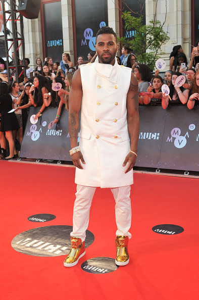Sleeveless vests might be the go-to summer piece for female fashionistas, but Jason Derulo proved it works on just about everyone. The “Want to Want Me” was ready for the upcoming season in a white double-breasted top with gold buttons, white trousers, and metallic gold high-tops.