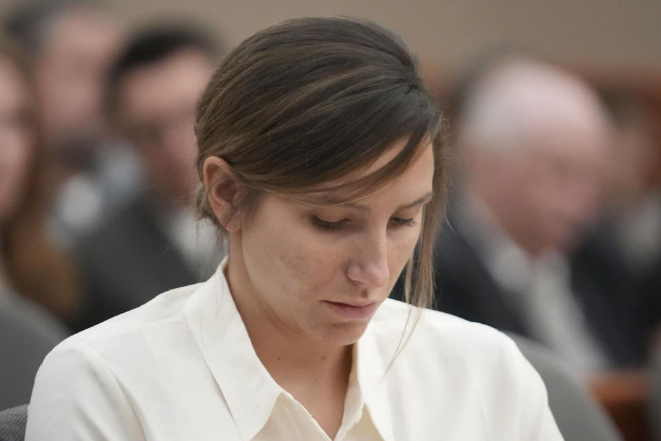 Kouri Richins, a Utah mother of three who authorities say fatally poisoned her husband then wrote a children's book about grieving, looks on during a bail hearing Monday, June 12, 2023, in Park City, Utah. A judge ruled to keep her in custody for the duration of her trial. (AP Photo/Rick Bowmer, Pool)