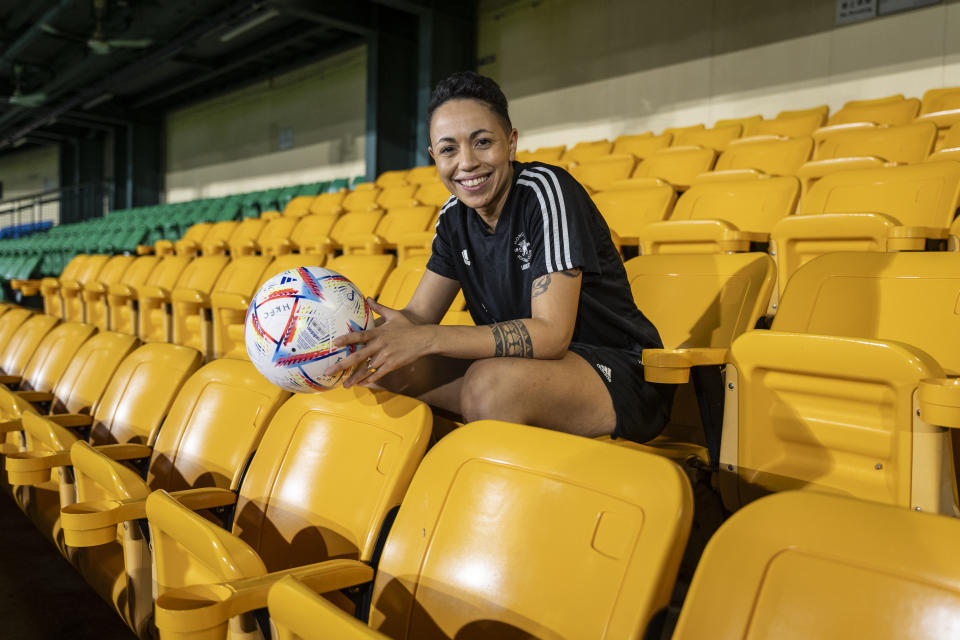 Gina Benjamin, vice captain of a women's seven-a-side team, poses for photographs during an interview in Hong Kong, Tuesday, Oct. 31, 2023. Set to launch on Friday, Nov. 3, 2023, the first Gay Games in Asia are fostering hopes for wider LGBTQ+ inclusion in the Asian financial hub. (AP Photo/Chan Long Hei)