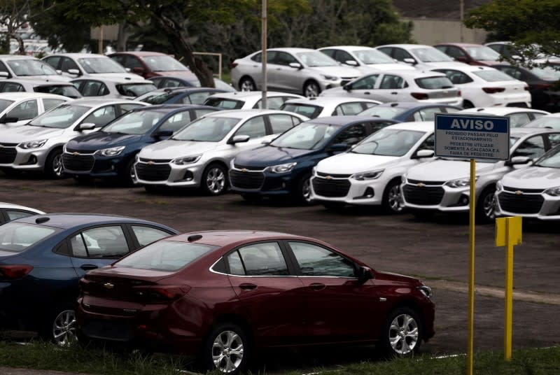 FILE PHOTO: Cars are pictured at the General Motors Co plant, that will give time off to its employees during the coronavirus disease (COVID-19) outbreak, in Sao Jose dos Campos