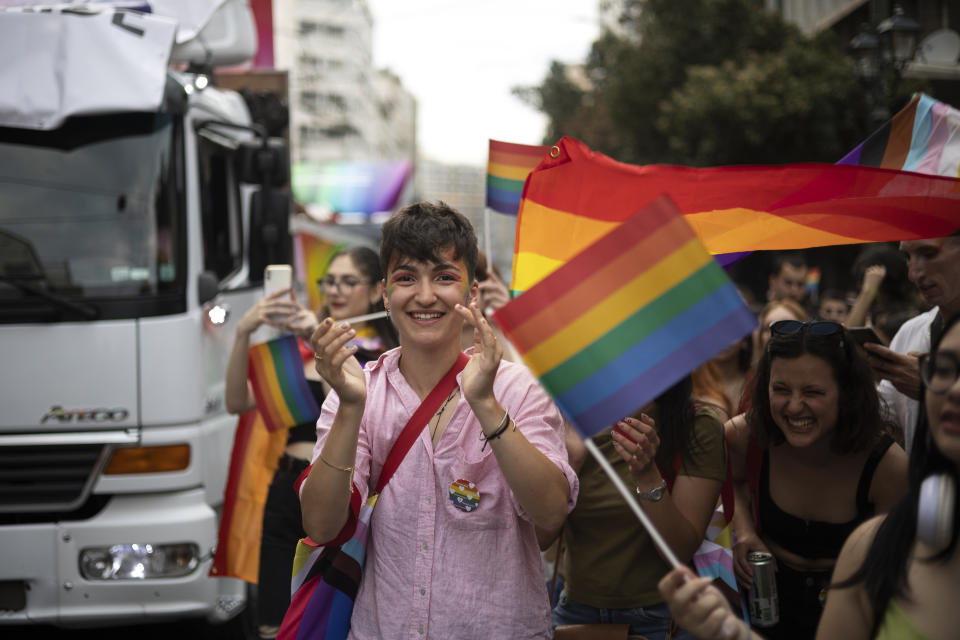 People participate in the annual Pride parade, in Athens, Saturday, June 10, 2023. June marks the beginning of Pride month in the U.S. and many parts of the world, a season intended to celebrate the lives and experiences of LGBTQ+ communities and to protest against attacks on hard-won civil rights gains. (AP Photo/Yorgos Karahalis)