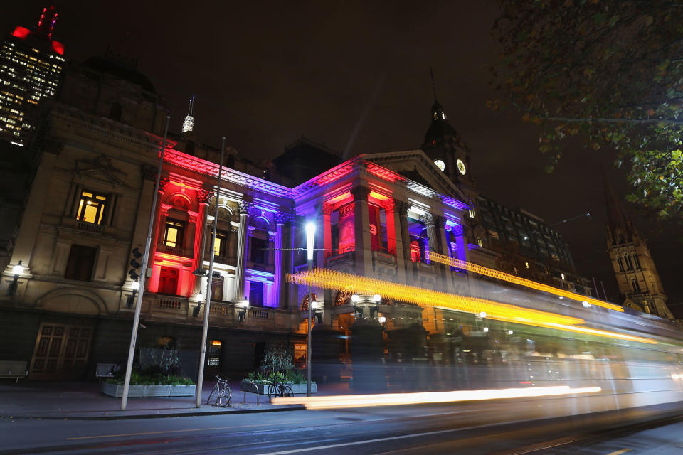 <p>The colors of the Union Jack, the national flag of the United Kingdom, are projected onto the Melbourne Town Hall as a tribute to Manchester Bombing victims on May 23, 2017 in Melbourne, Australia. (Michael Dodge/Getty Images) </p>