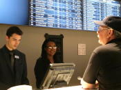 In this June 27, 2019 photo, a gambler ponders the odds at a betting window at the new sportsbook at Bally's casino in Atlantic City, N.J. New Jersey surpassed Nevada in terms of sports betting volume in May, taking the national lead for the first time. (AP Photo/Wayne Parry)