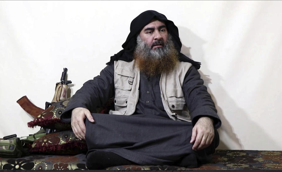 This image made from video posted on a militant website on Monday, April 29, 2019, purports to show the leader of the Islamic State group, Abu Bakr al-Baghdadi, being interviewed by his group's Al-Furqan media outlet. Al-Baghdadi acknowledged in his first video since June 2014 that IS lost the war in the eastern Syrian village of Baghouz that was captured last month by the Kurdish-led Syrian Democratic Forces. (Al-Furqan media via AP)